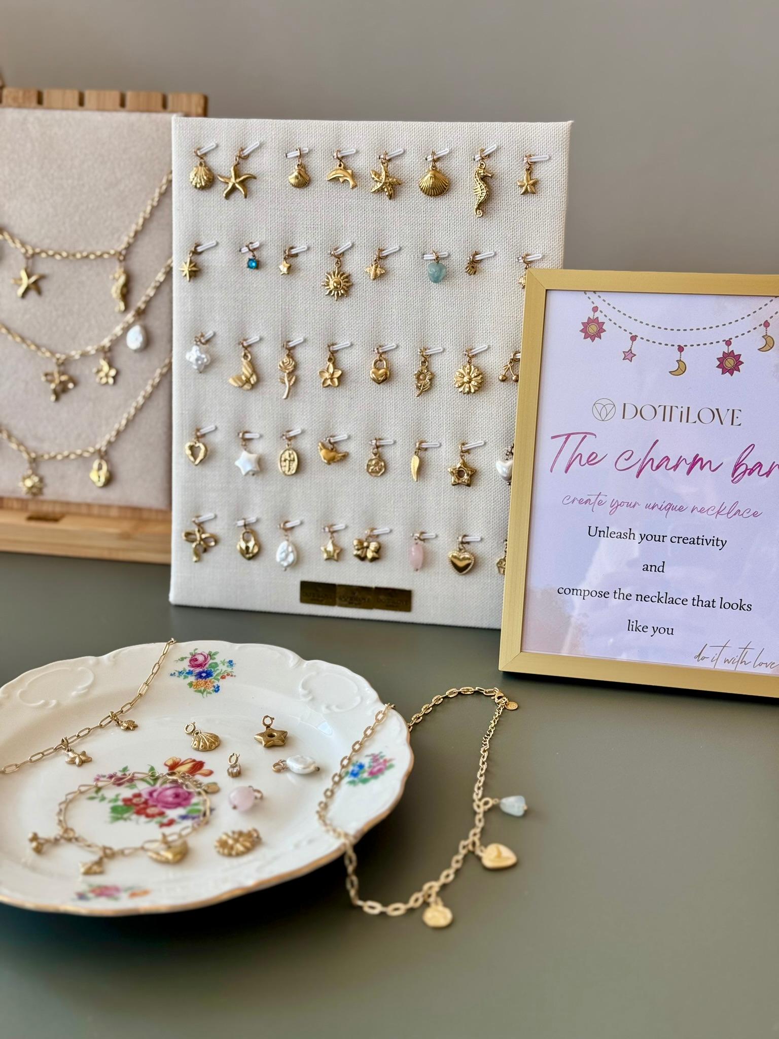 Sélection de charms de la marque Dottilove présentés chez Mim's à Leuze – Bijoux de créateurs