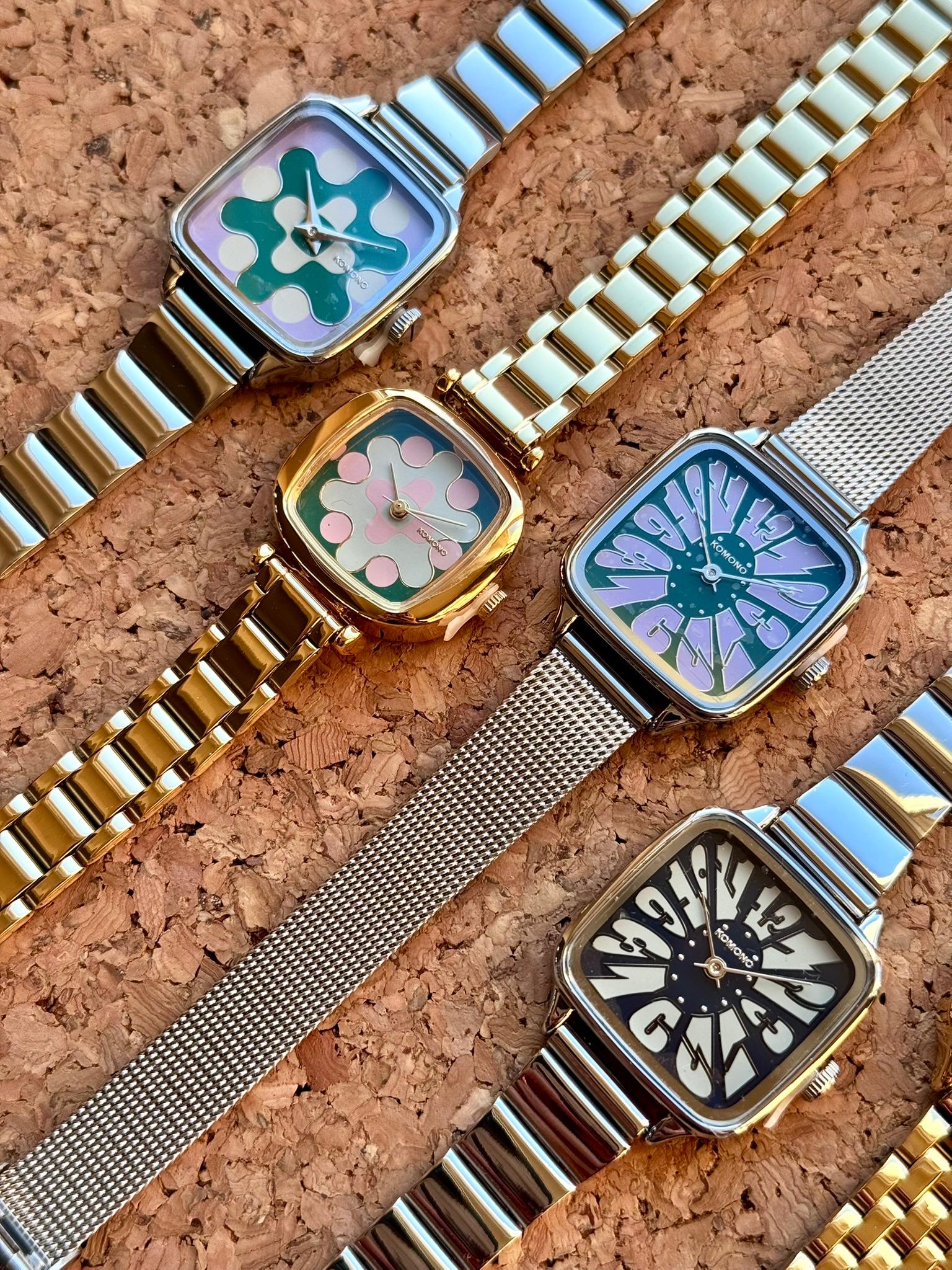 Montres Komono exposées en boutique, créateur basé à Anvers